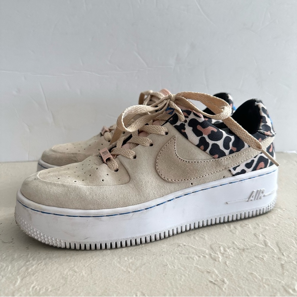 Nike Women’s Beige Sneakers with Black and Pink Leopard Accent